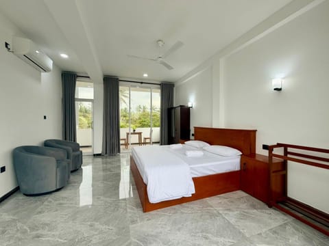 Bed, Photo of the whole room, Bedroom, towels, air conditioner