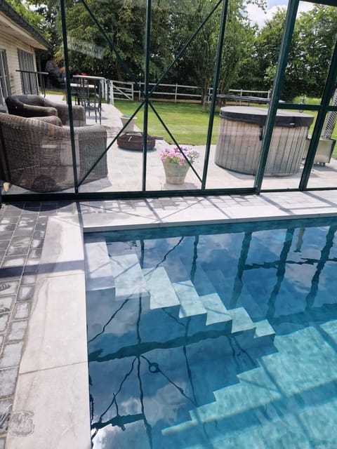 Property building, Patio, Day, Garden, View (from property/room), Balcony/Terrace, Garden view, Pool view, Swimming pool, sunbed