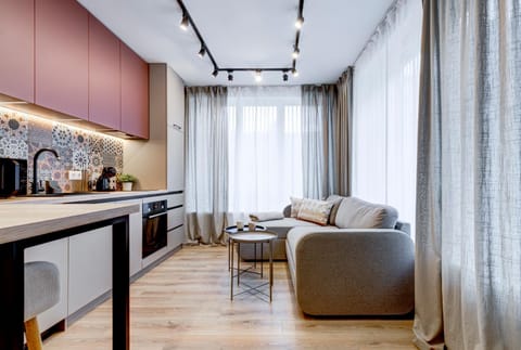 Kitchen or kitchenette, Living room, Seating area, Dining area
