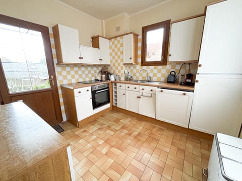 Kitchen or kitchenette, dishwasher, oven, stove, toaster