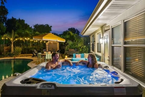 Resort Style Backyard Pool Hot Tub Games House in Bay Pines