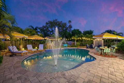 Resort Style Backyard Pool Hot Tub Games House in Bay Pines
