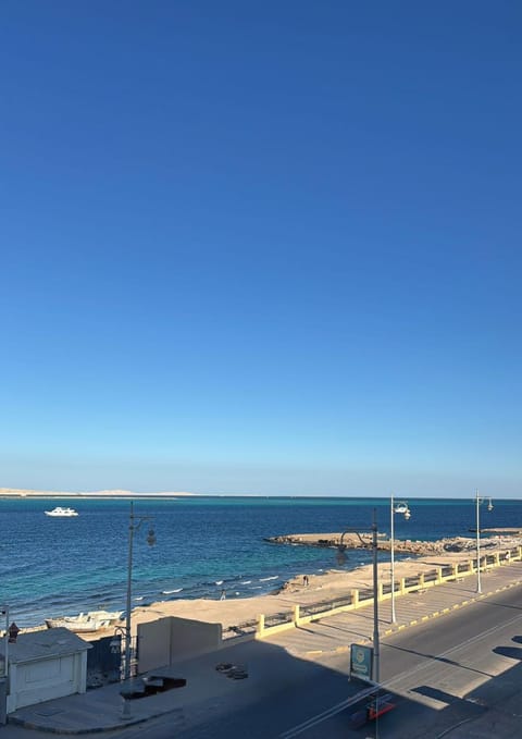 Property building, Nearby landmark, Day, Natural landscape, Beach, Sea view