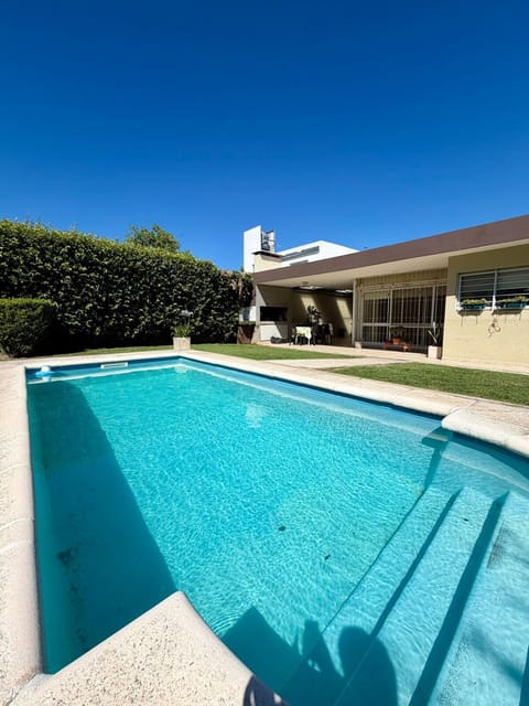 Property building, Day, Pool view, Swimming pool, sunbed