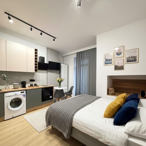Bed, TV and multimedia, Kitchen or kitchenette, wardrobe, washing machine