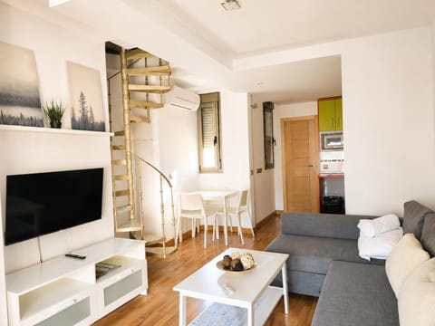 Bed, TV and multimedia, Living room, Seating area