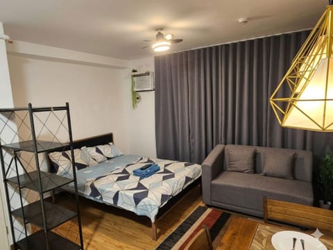 Bed, Living room, Seating area, Bedroom