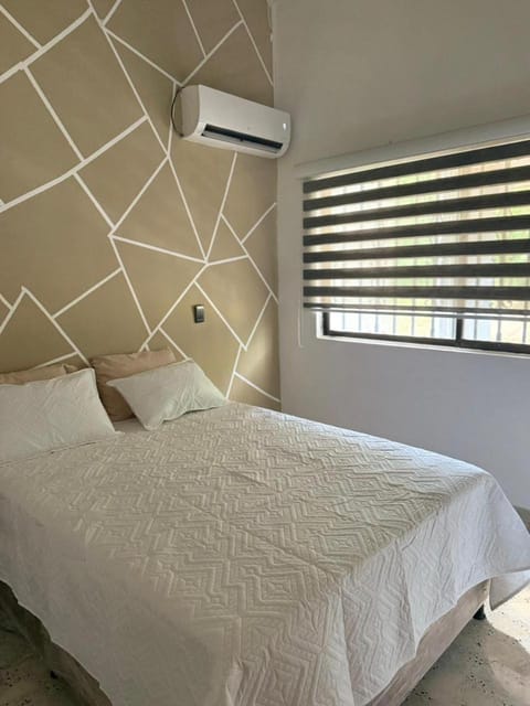 Photo of the whole room, air conditioner