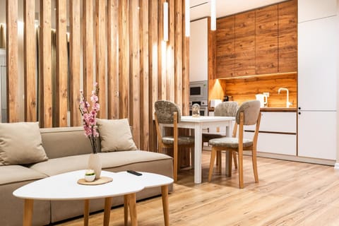 Kitchen or kitchenette, Living room, Seating area, Dining area