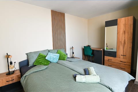 Bed, Photo of the whole room, towels, wardrobe