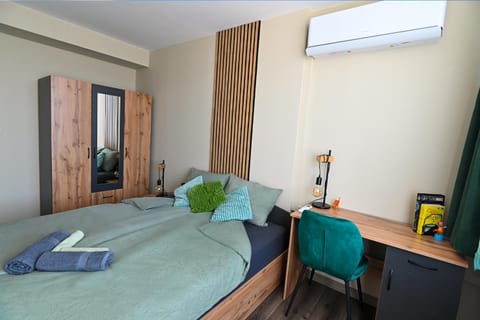 Bed, Photo of the whole room, Bedroom, towels, wardrobe, air conditioner