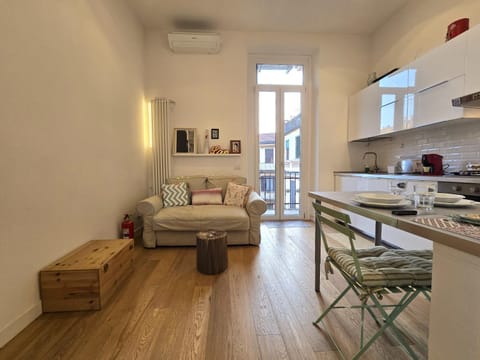 Living room, Seating area, Dining area, oven, stove, toaster