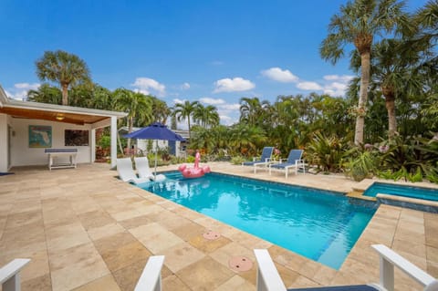 Canal Walk: Tiki Bar, Mini Golf, Pool & Spa On Canal by Anna Maria Life Vacation Rentals House in Holmes Beach