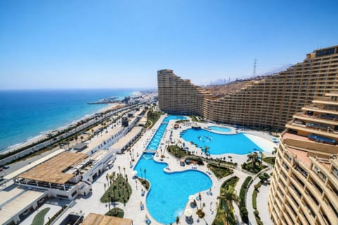 Property building, Natural landscape, Bird's eye view, Beach, Pool view, Sea view, Swimming pool