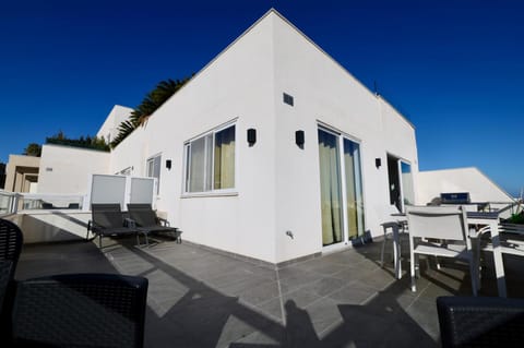 Property building, Day, View (from property/room), Balcony/Terrace, sunbed