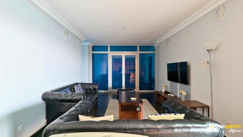 Communal lounge/ TV room, TV and multimedia, Seating area, air conditioner