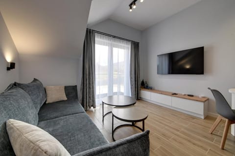 Bed, TV and multimedia, Living room, Photo of the whole room, Seating area