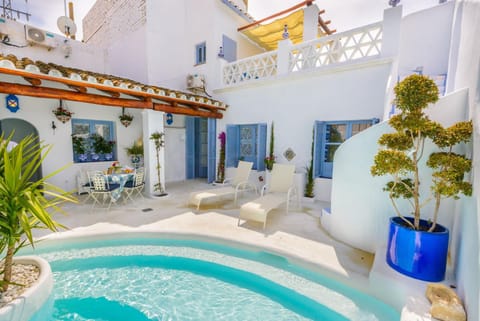 Property building, Living room, Swimming pool
