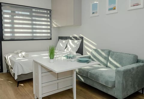 Bed, Living room, Seating area, Dining area, Bedroom