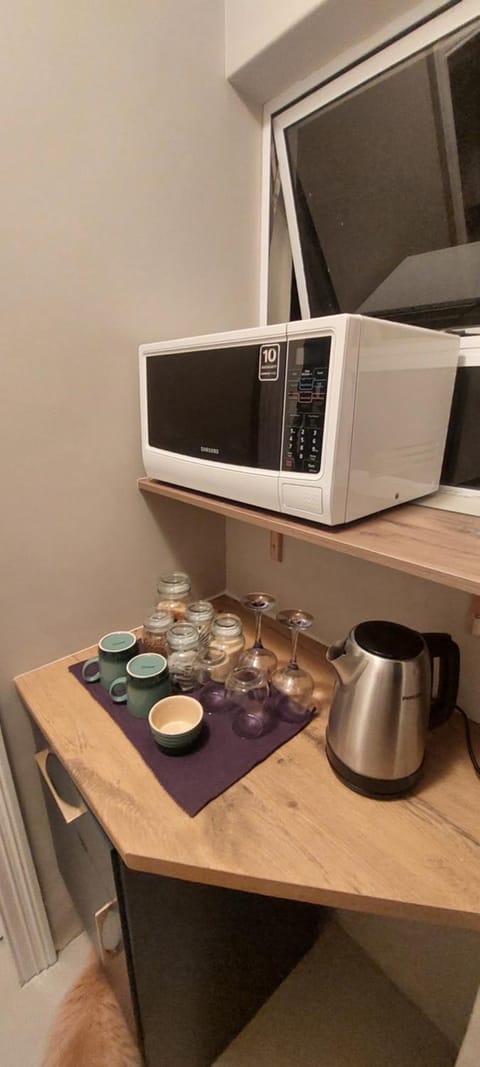 Coffee/tea facilities, Kitchen or kitchenette, microwave, minibar, wardrobe