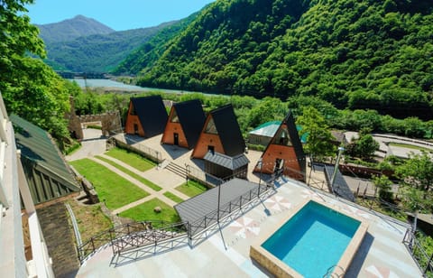 Property building, Nearby landmark, Spring, Day, Natural landscape, Bird's eye view, Mountain view, Pool view, Swimming pool, Swimming pool, sunbed