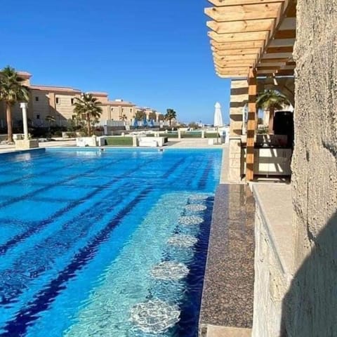 Swimming pool, sunbed