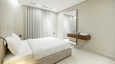 Bed, Photo of the whole room, Bedroom, hair dresser, towels, air conditioner