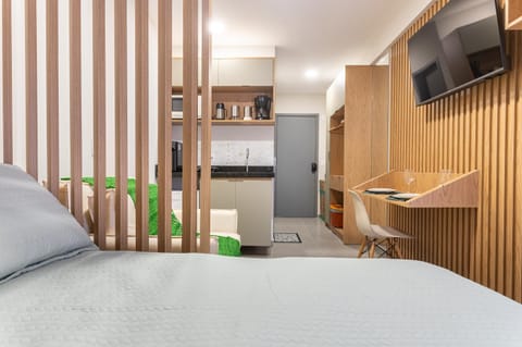 Communal lounge/ TV room, Bed, Kitchen or kitchenette, Seating area, Bedroom