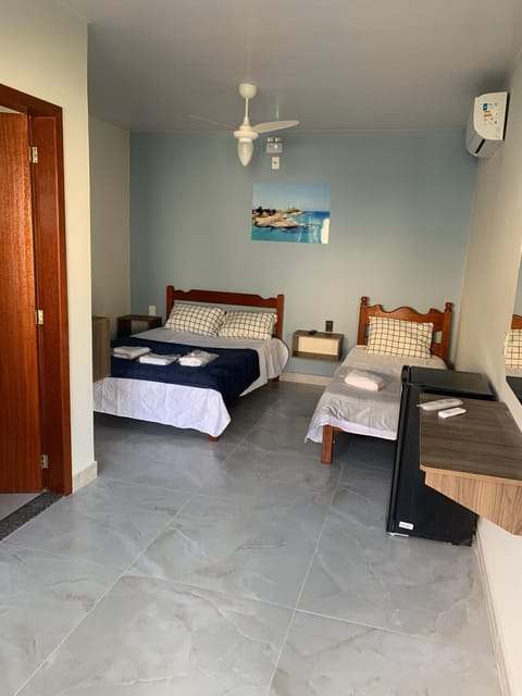 Bed, Photo of the whole room, Bedroom, towels, air conditioner