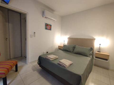 Bed, Photo of the whole room, Bedroom, towels, air conditioner