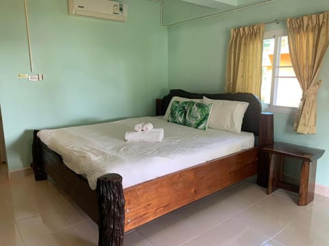 Bed, Photo of the whole room, Bedroom, towels, air conditioner