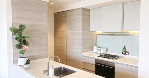 Kitchen or kitchenette, stove, toaster