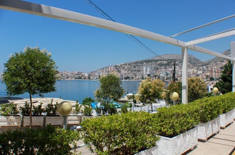 Patio, Facade/entrance, Day, Garden, Balcony/Terrace, Floor plan, Beach, City view, Sea view, Street view