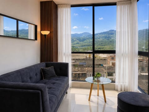 Natural landscape, View (from property/room), Living room, Seating area, Mountain view