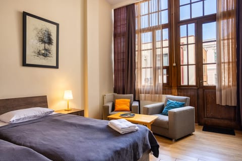 Bed, Living room, Photo of the whole room, Seating area, Bedroom
