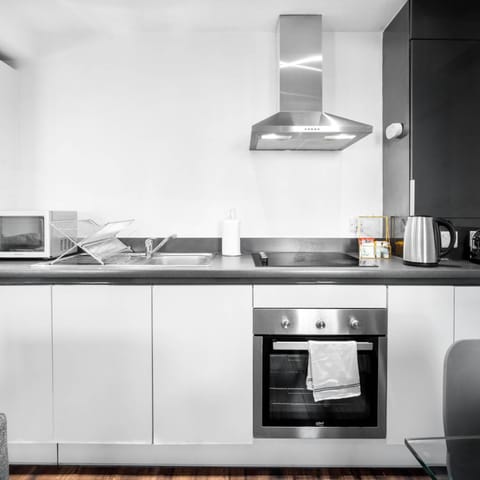 Kitchen or kitchenette, stove, toaster