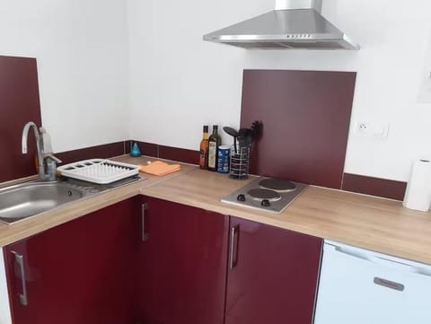 Kitchen or kitchenette, stove