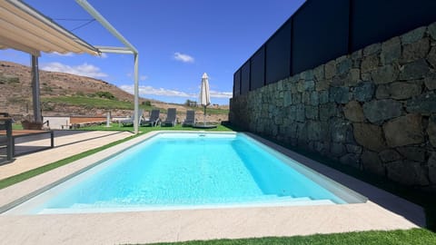 Property building, Living room, Swimming pool