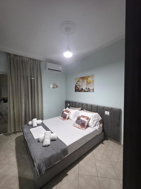 Bed, Photo of the whole room, Bedroom, towels, air conditioner