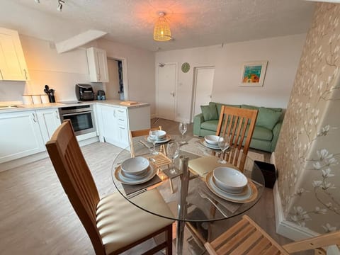 Kitchen or kitchenette, Living room, Seating area, Dining area, oven, stove, toaster