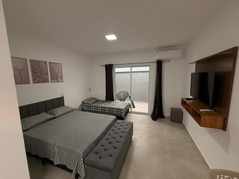 Property building, Bed, TV and multimedia, Living room, Photo of the whole room, Bedroom