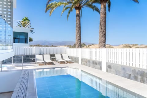 Property building, Living room, Swimming pool