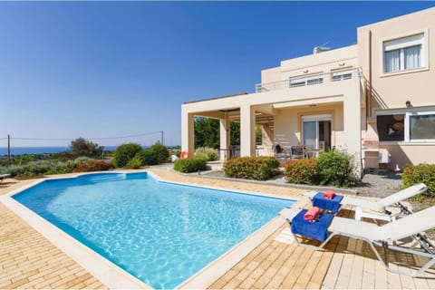 Property building, Patio, Natural landscape, Pool view, Sea view, Swimming pool, sunbed