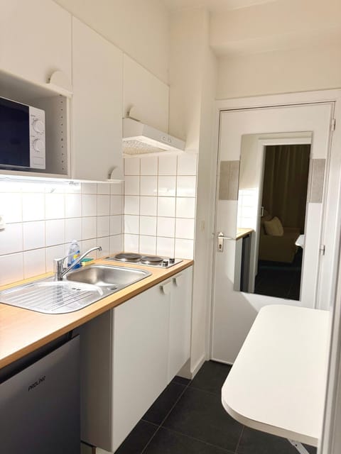 Kitchen or kitchenette, stove