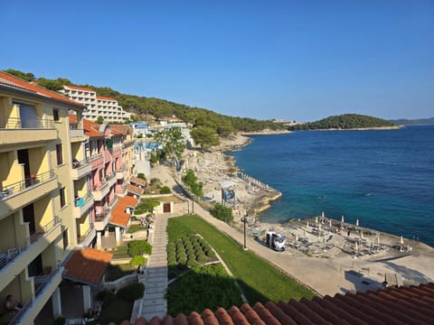 Property building, Natural landscape, Beach, Sea view
