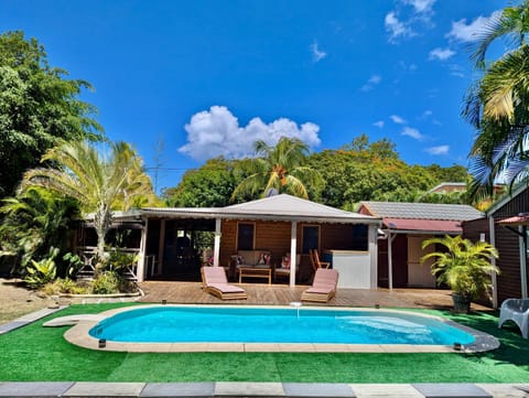Property building, Patio, Day, Garden, Garden view, Pool view, Swimming pool, sunbed