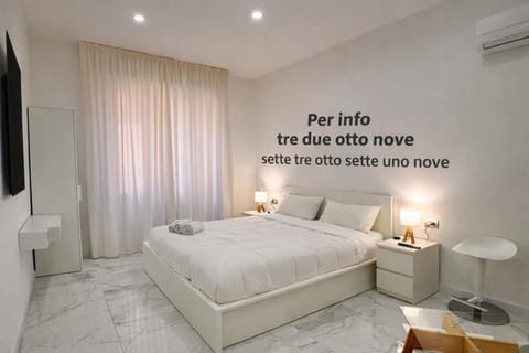 Bed, Photo of the whole room, Bedroom, Text overlay, air conditioner