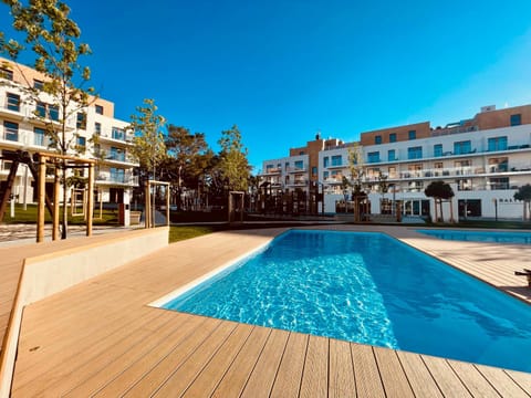 Property building, Day, Pool view, Swimming pool, sunbed
