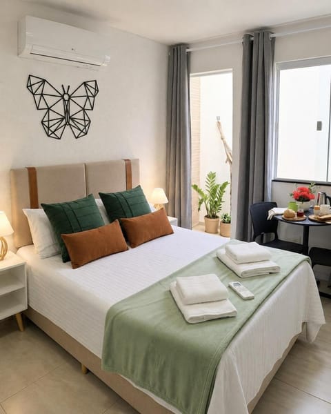 Bed, Photo of the whole room, Bedroom, towels, air conditioner