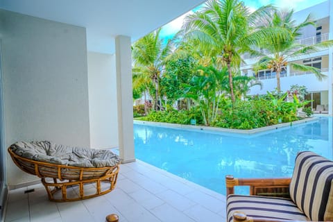 Patio, Seating area, Garden view, Pool view
